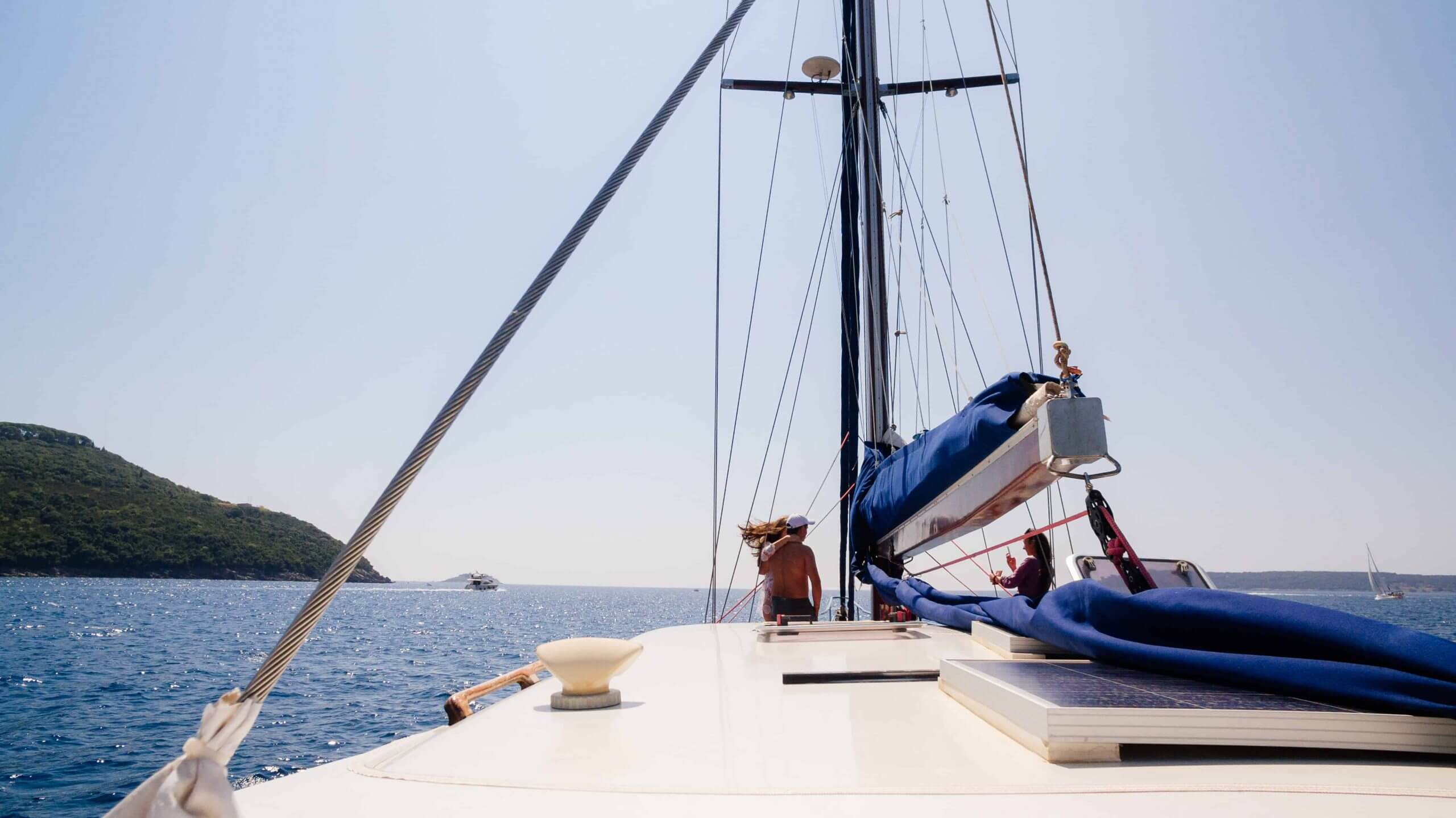 Friends in a yacht enjoying the sea view